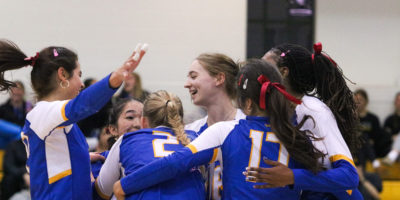 The TMU Bold women's team celebrating a win after losing 15 games in a row